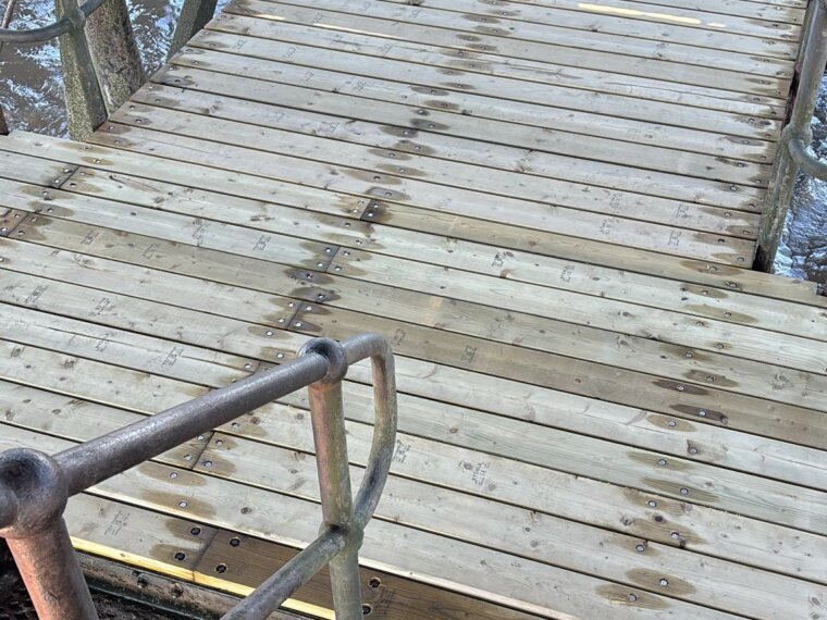 New timber decking and cast iron grating on the Clevedon Pier landing stage