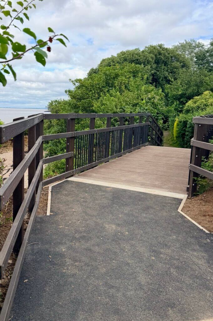 Looking across the new FRP footbridge deck at Portishead Yacht and Boat Club with the estuary behind
