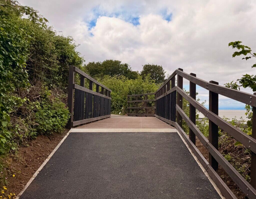 New tarmac approach ramp and railings leading onto the FRP footbridge at Portishead Yacht and Boat Club