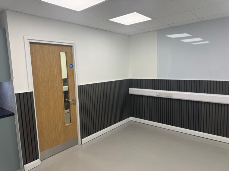 Office corner showing internal door, slatted cladding and epoxy resin floor